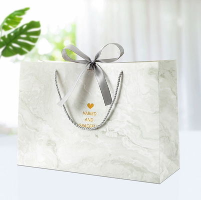 Good price Business Cosmetics Jewelry Packaging Bags Shopping Bags Gift Paper Bag With Ribbon Bow online