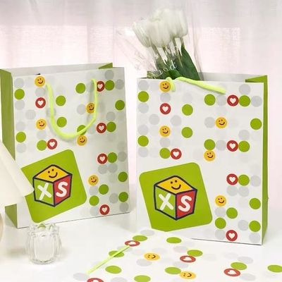 Good price Clothing Store Flower Paper Shopping Bags Holiday Gift Packaging Bags Tote Bags Custom Printed Logo online