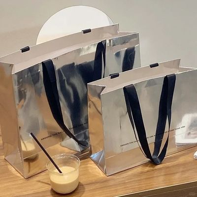 Good price Paper Gift Bag Clothing Shopping Bag Silver Card Kraft Paper Handbag Printing Logo online