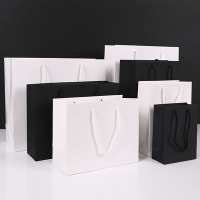 kopen Premium Kraft Papieren Cadeautassen Verdikte Kleding Winkelzakken Met Touwhandvatten online vervaardiging