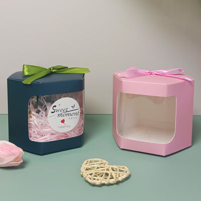 comprar Cajas de regalo hexagonales con lazo de papel impreso para festivales personalizadas Fabricación en línea