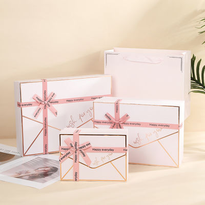 Harga yang bagus New Exquisite Gift Box With Bow Creative Design For Holiday Clothing And Cosmetics Gift Packaging on line