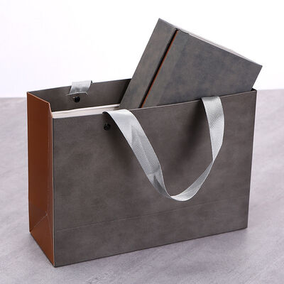 Bon prix Boîte et sac cadeaux imprimés sur mesure en feuille d'or/UV en ligne