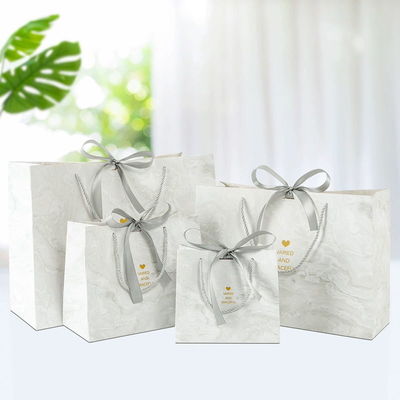 Bon prix Sacs de magasinage en papier 100% recyclables jetables en ligne