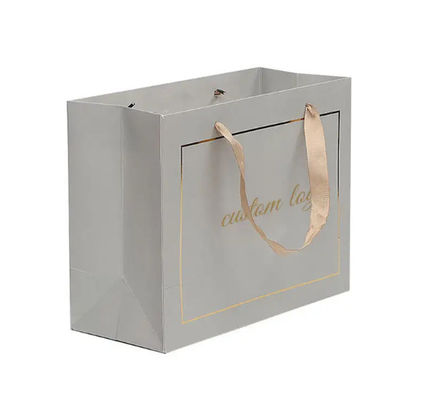 Sacs de magasinage en carton et en papier Sacs cadeaux de luxe sur mesure avec poignées de logo