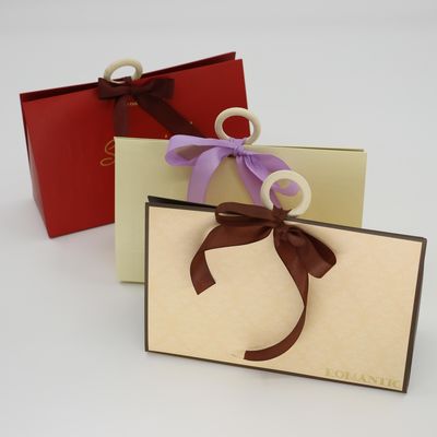 良い値段 素敵な結婚式のプレゼントの包装 リボンボックス バレンタインデーのキャンディギフトボックス ハンドル付き オンライン
