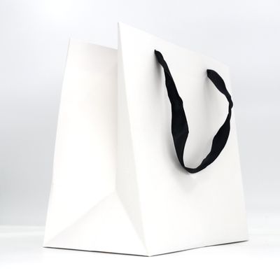 Goede prijs Gepersonaliseerd Logo Uitstekende Luxe Recycled Cardboard Shopping Bag Gift Bag Voor Kleding Handwerk Verjaardag Of Gift Gebruik online