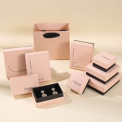 Bon prix Boîte à tiroirs pour bracelet rose Collier Bague Boîte coulissante Boîte de rangement pour bagues Boîte d'emballage de bijoux Logo imprimé en ligne