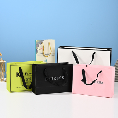 Good price Thickened White Cardboard Handbags Customized Souvenir Bags Clothing Store Holiday Gift Bags online