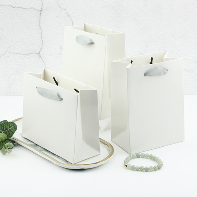Good price Off-White Paper Bags For Jewelry Packaging Custom Birthday And Holiday Gift Bags With Logo Printing online