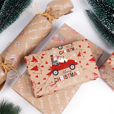 Guter Preis Vintage Kraft Weihnachtspackung Doppelseitig gedruckte Geschenkverpackungspapier Weihnachtsmann entwirft umweltfreundliches Walzenverpackungspapier Online