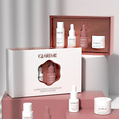 Good price Luxury Serum Gift Box Set Premium Cosmetic Packaging With Laser Cut Design Elegant Hollow Pattern Gold Foil Stamping online